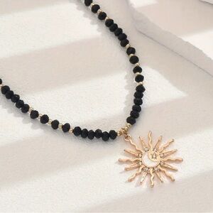 Black and Gold Sun Pendant Necklace